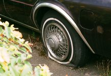 flat tire - photo by Sebastian Huxley on Unsplash