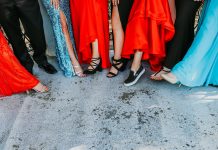 prom goers showing off footwear - image by chelseighmillar from Pixabay