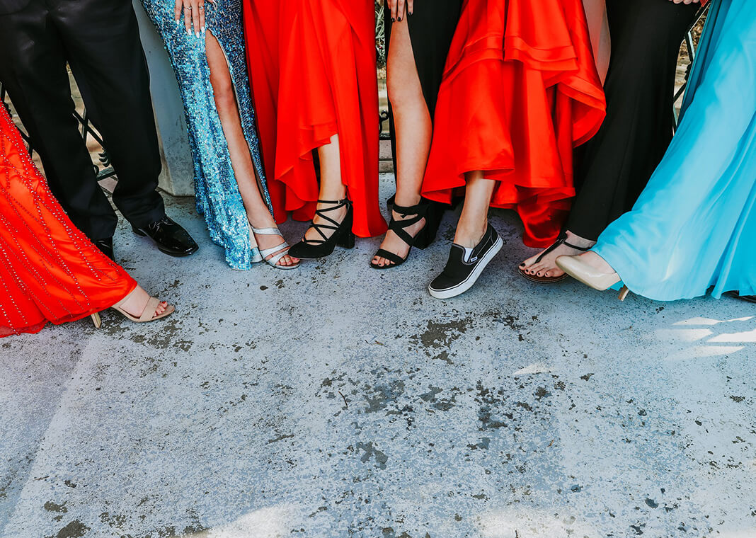 prom goers showing off footwear - image by chelseighmillar from Pixabay