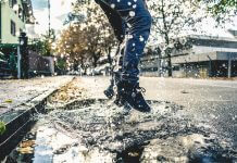 leaping into puddle - photo by Raphael Schaller on Unsplash