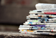 stack of newspapers - image by congerdesign from Pixabay