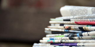 stack of newspapers - image by congerdesign from Pixabay