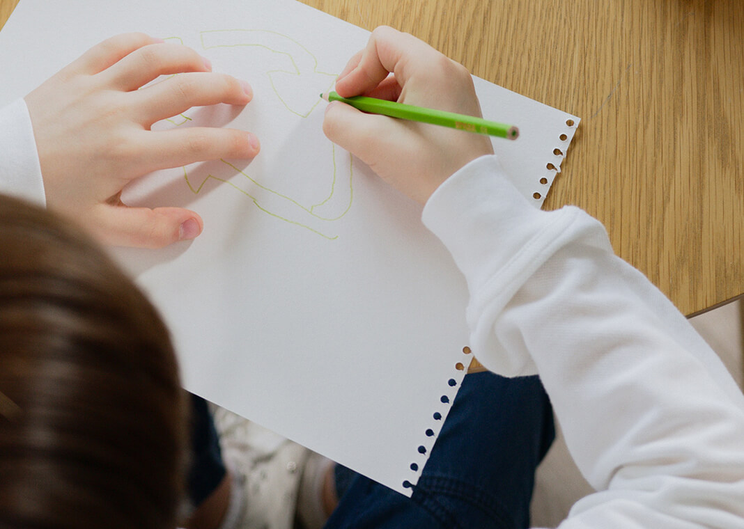 middle-school boy drawing - photo by Artem Podrez from Pexels