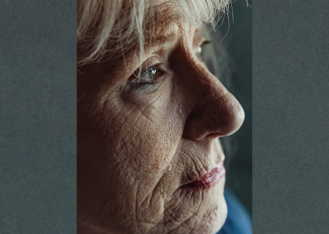 woman with gray hair crying - photo by Kindel Media from Pexels