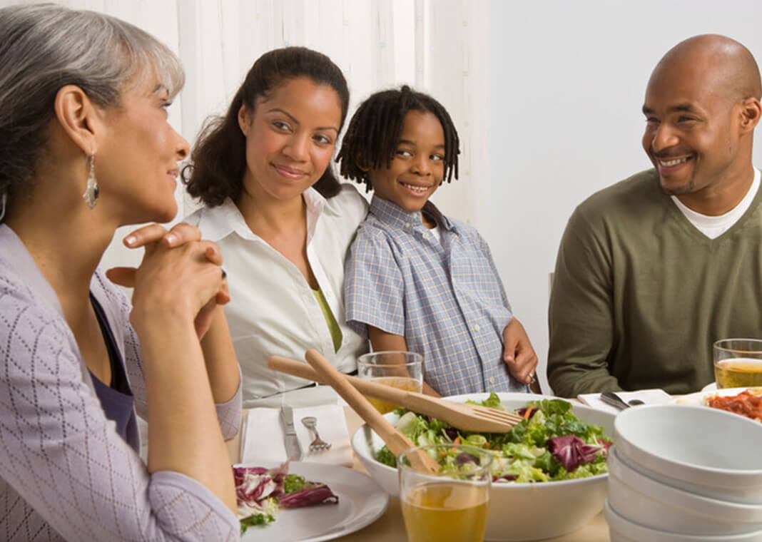 family at dinner table - photo by Creatas/Jupiterimages/Getty Images