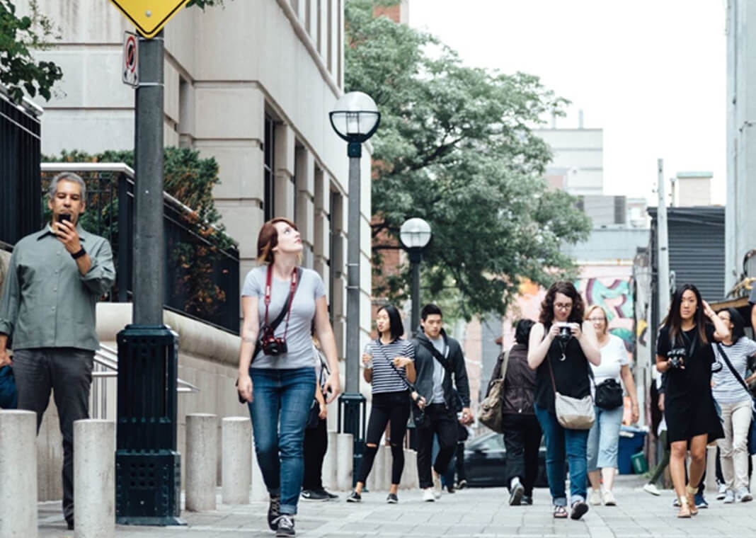 sidewalk crowd - photo by PIXNIO