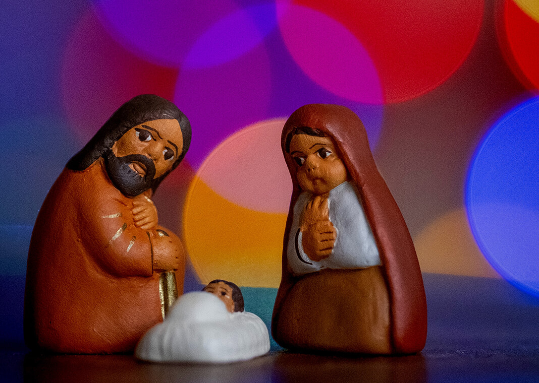 nativity holy family against colorful background - photo by Árni Svanur Daníelsson on Unsplash