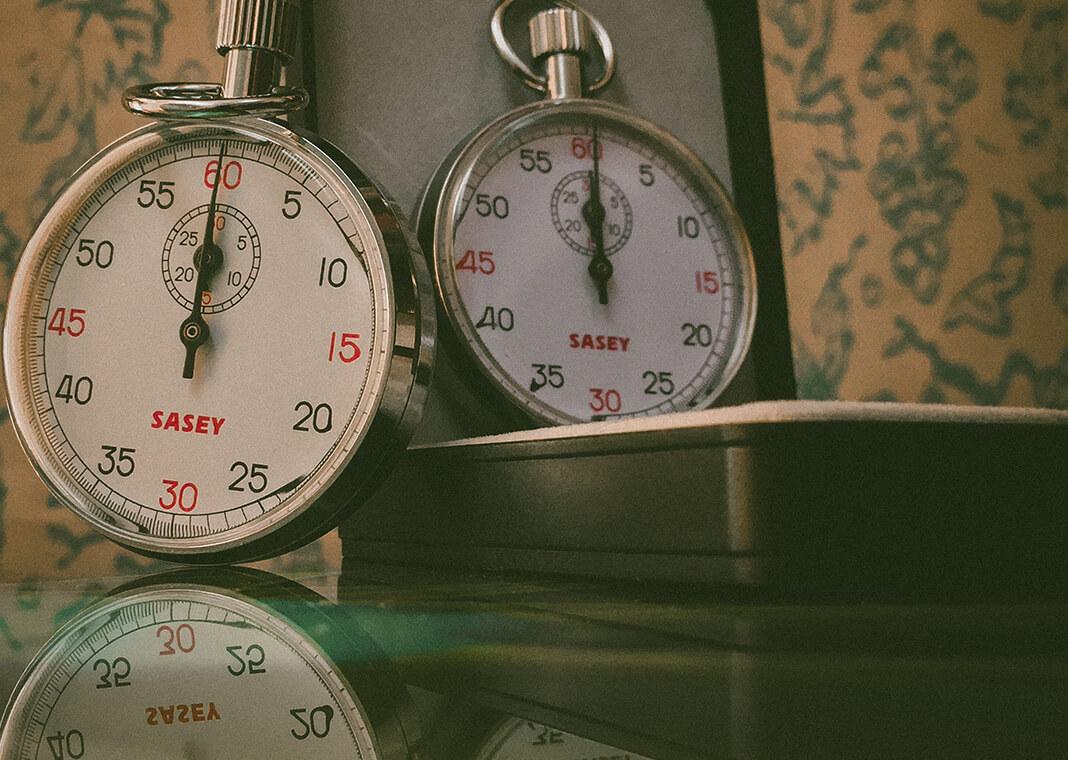 stopwatches with reflection - photo by Alla Eddine Taleb from Pexels