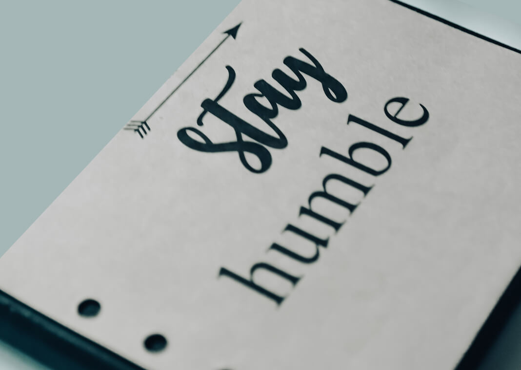 stay humble - words on notebook - photo by Maddy Freddie from Pexels