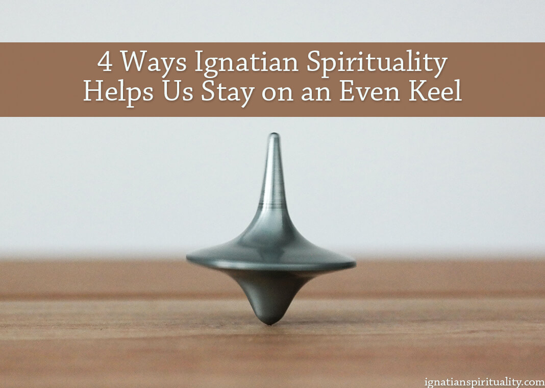 4 Ways Ignatian Spirituality Helps Us Stay on an Even Keel - text over photo of balanced top by Christophe Hautier on Unsplash