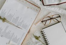 Bible, glasses, and notebook - photo by Tara Winstead on Pexels