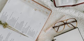 Bible, glasses, and notebook - photo by Tara Winstead on Pexels