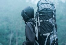 hiker with backpack in foggy weather - photo by Lalu Fatoni on Pexels