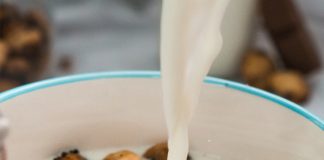 pouring milk in cereal bowl - photo by Mateusz D on Unsplash