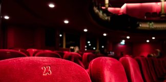 theater seats - photo by Kilyan Sockalingum on Unsplash