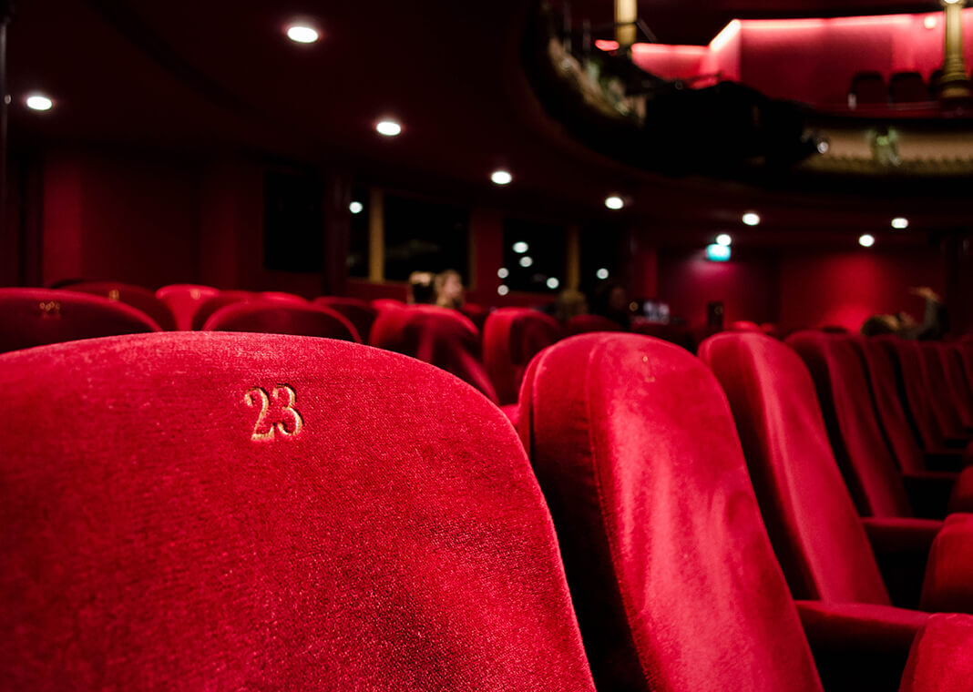 theater seats - photo by Kilyan Sockalingum on Unsplash
