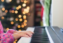 child playing piano - Cavan Images/Getty Images