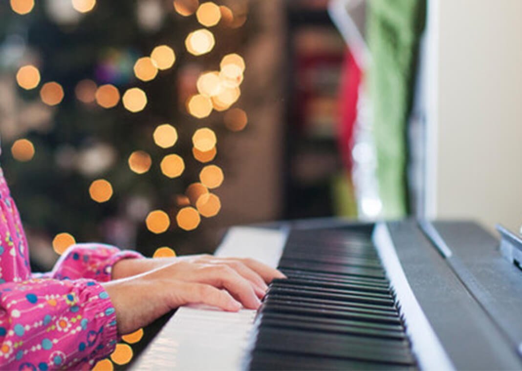 child playing piano - Cavan Images/Getty Images