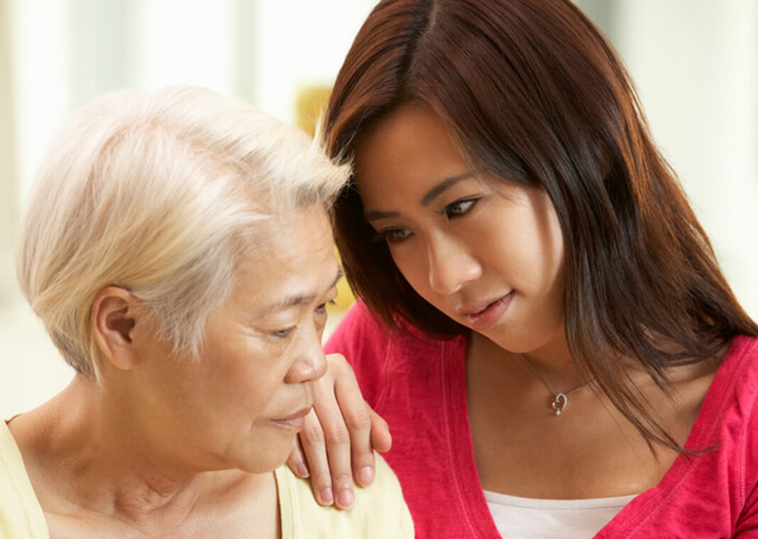 worried woman and daughter - Monkey Business Images Ltd/Getty Images