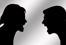 silhouettes of man and woman screaming at each other - image by Gerd Altmann from Pixabay