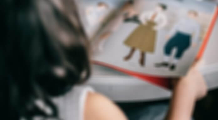 girl reading - photo by Meruyert Gonullu via Pexels (blurred)