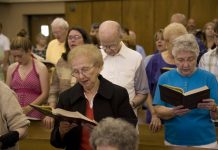 congregation singing at Mass - Phil Martin Photography © Loyola Press. All rights reserved.