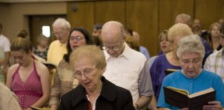 congregation singing at Mass - Phil Martin Photography © Loyola Press. All rights reserved.