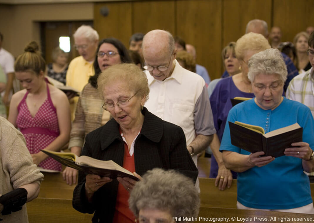 congregation singing at Mass - Phil Martin Photography © Loyola Press. All rights reserved.