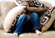 child hiding under pillows - image by ambermb from Pixabay