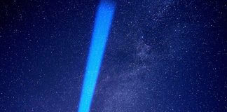 beam of blue light in night sky - image by torstensimon from Pixabay