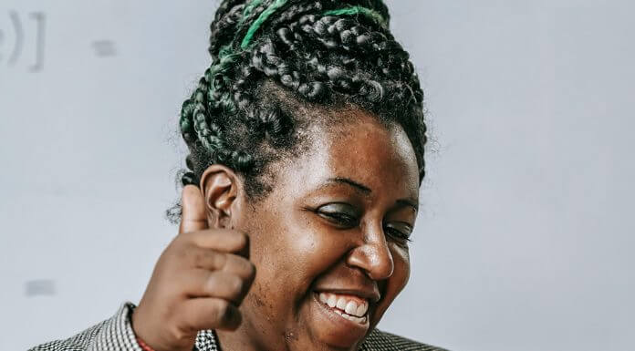 confident woman giving thumbs up - photo by Katerina Holmes via Pexels