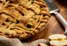 cut apple next to baked apple pie - photo by stephanie monfette on Unsplash