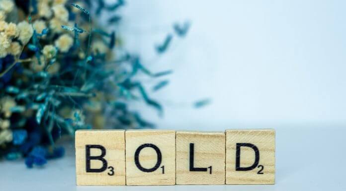 letter tiles spelling out "bold" - photo by Alex Shute on Unsplash