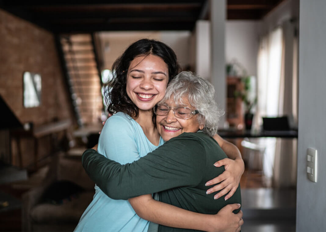 grandmother and granddaughter hug - FG Trade/E+/Getty Images