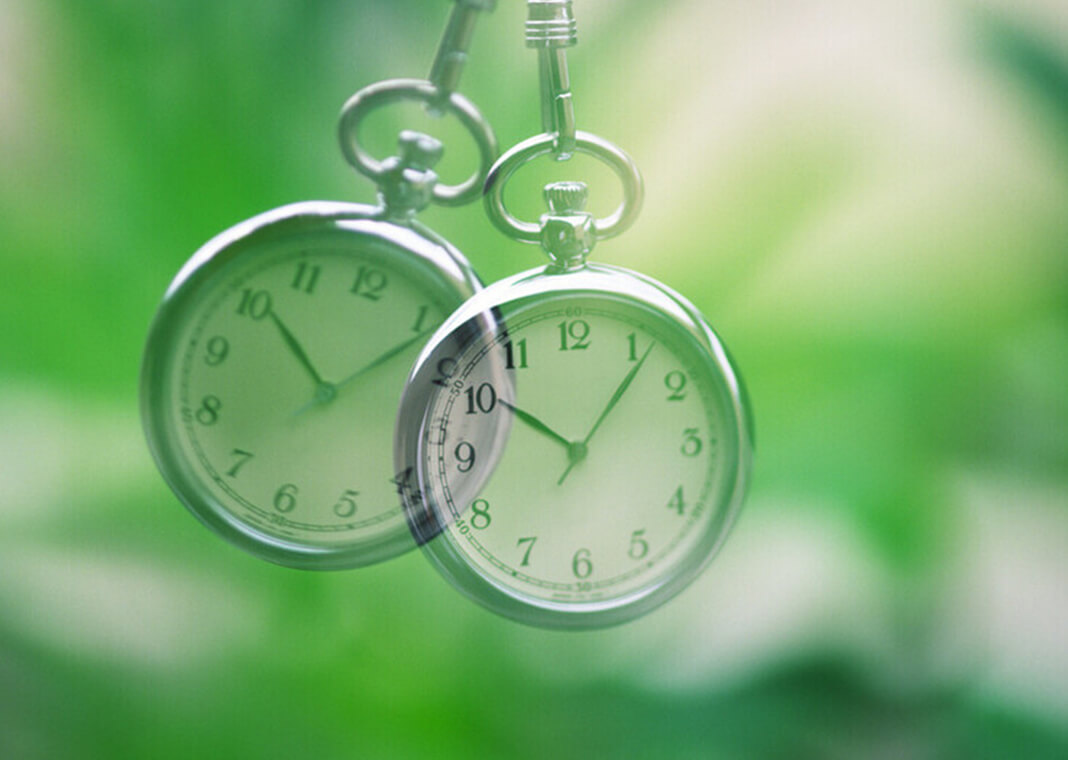 clock - double-exposure suggesting passage of time - ooyoo/E+/Getty Images