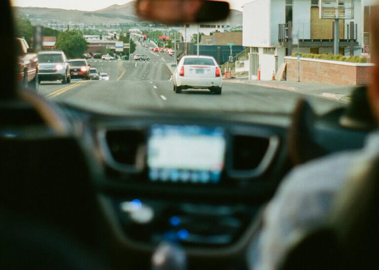 driving - focus on dashboard controls - photo by Marc Pagliuca on Unsplash